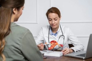 Female doctor explaining reproductive health and infertility treatment to a patient at a sexual health clinic in Nashik for fertility and women wellness consultation.